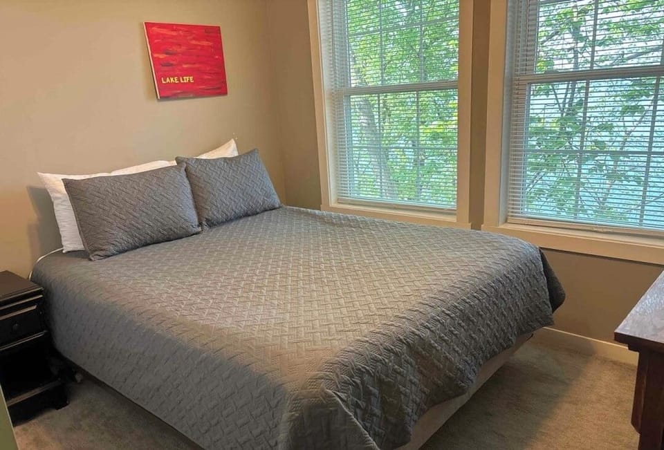 Bedroom 1 - Queen Bed with Lakeview