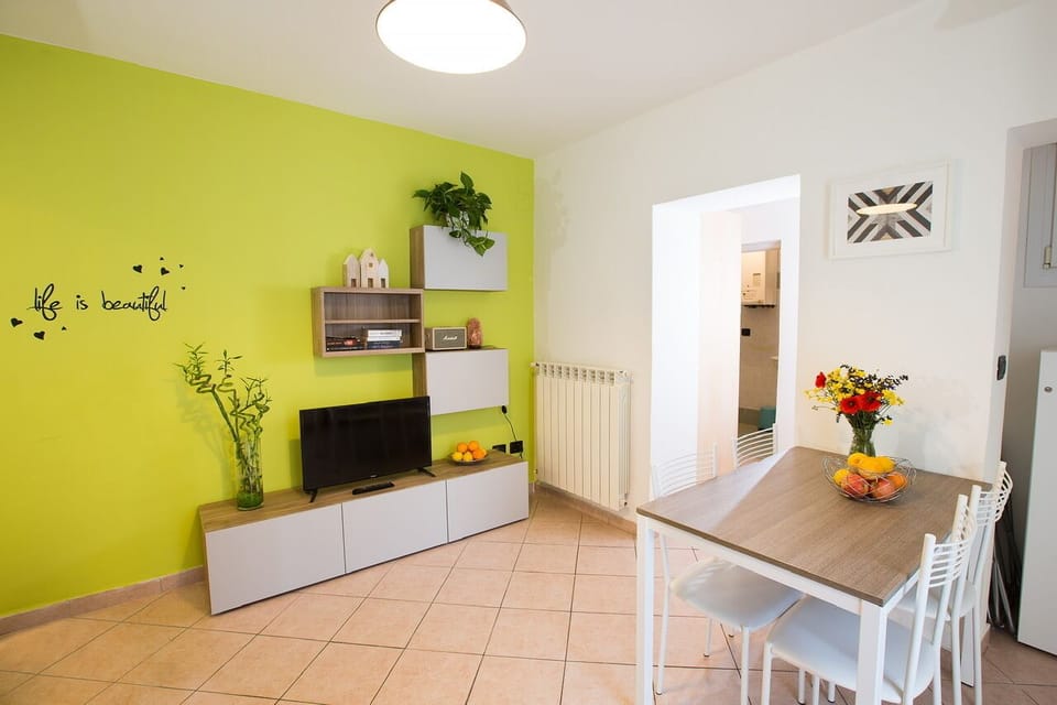 Apartment (SantOrsola apartment) | Living area | 42-inch flat-screen TV with cable channels