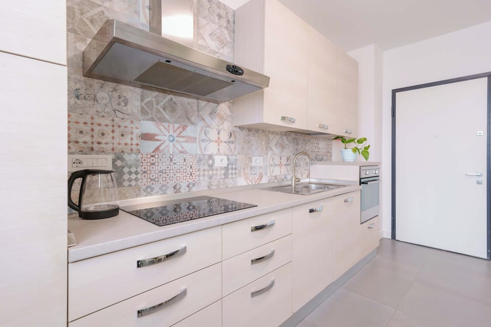 Apartment (West Side) | Private kitchen | Full-size fridge, oven, stovetop, espresso maker