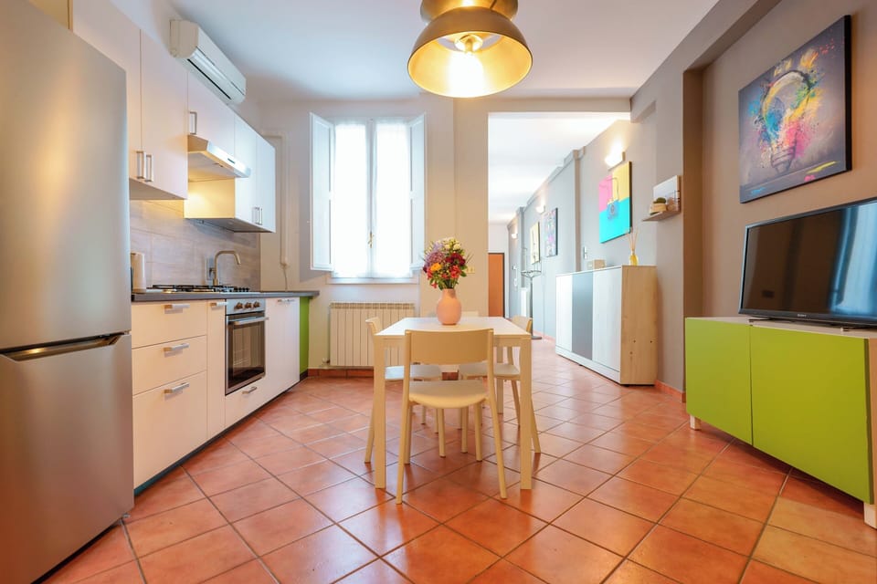Apartment (Zamboni 58) | Private kitchen | Full-size fridge, oven, stovetop, espresso maker