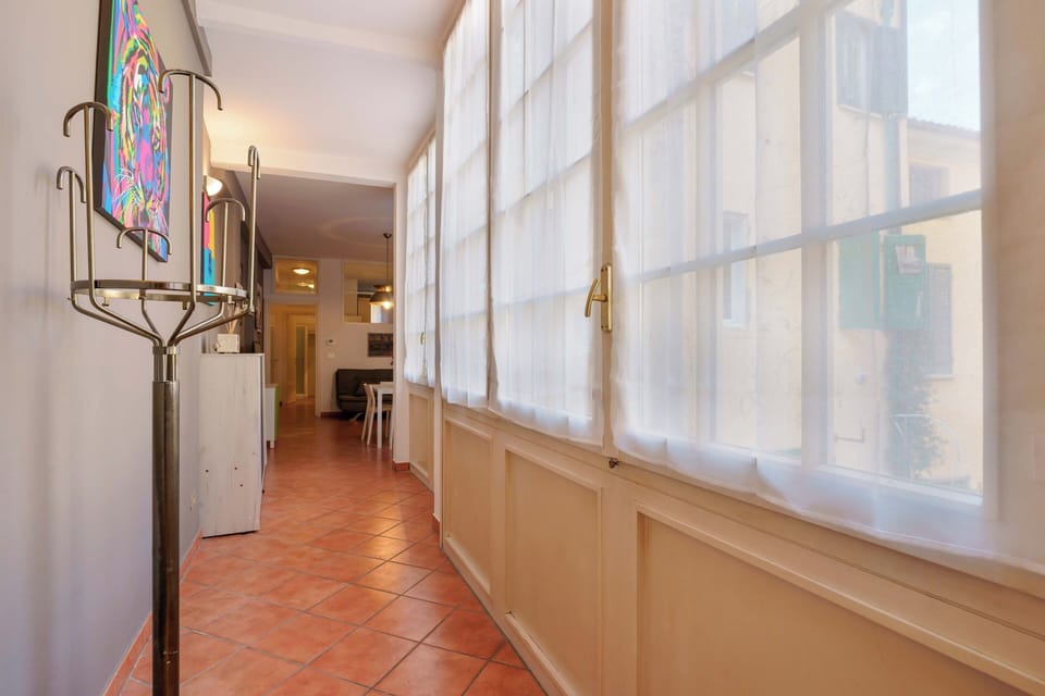 Apartment (Zamboni 58) | Living area | 45-inch flat-screen TV with digital channels