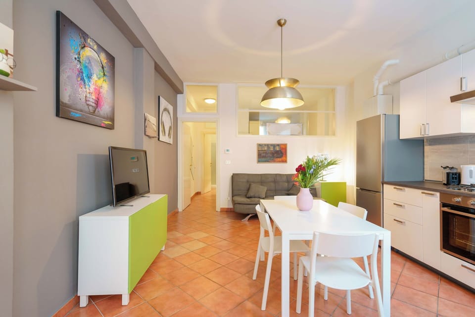 Apartment (Zamboni 58) | Private kitchen | Full-size fridge, oven, stovetop, espresso maker