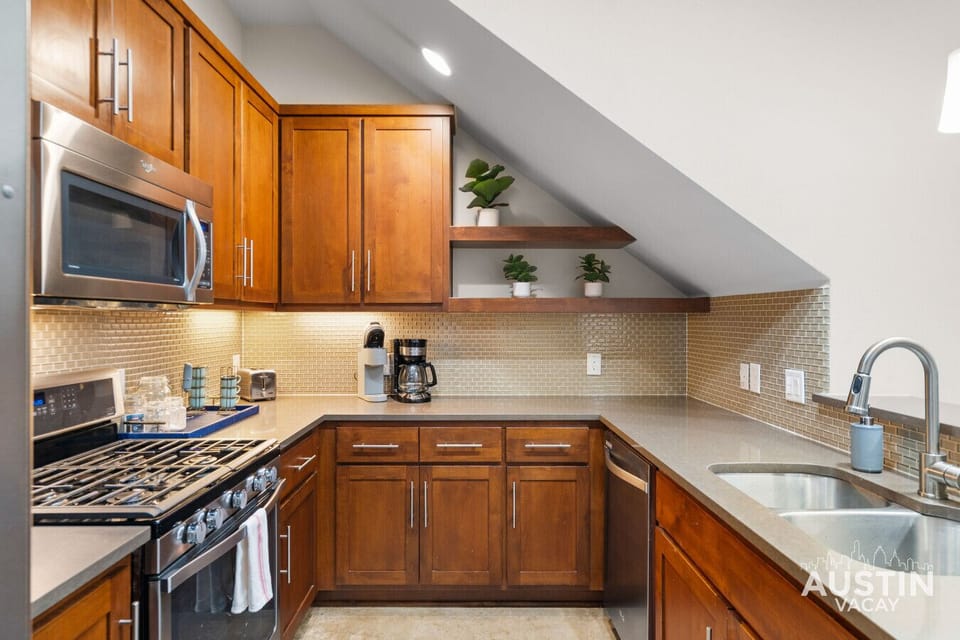 Spacious kitchen layout with expansive prep space and storage