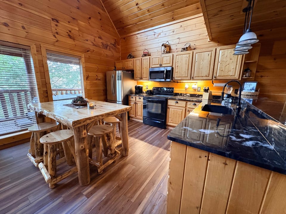 Well-equipped kitchen featuring modern appliances and ample space.