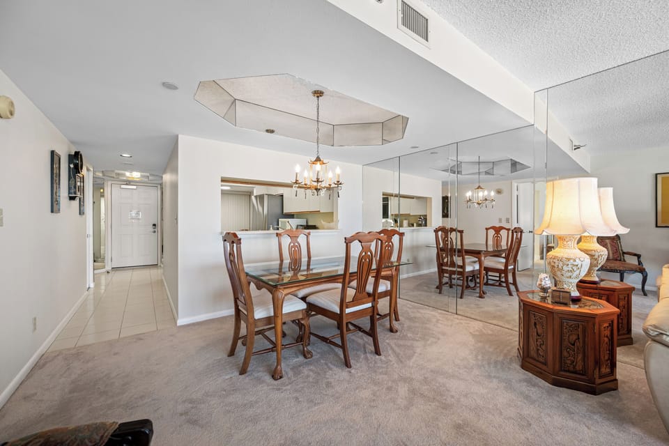 Dining table for four with a chandelier