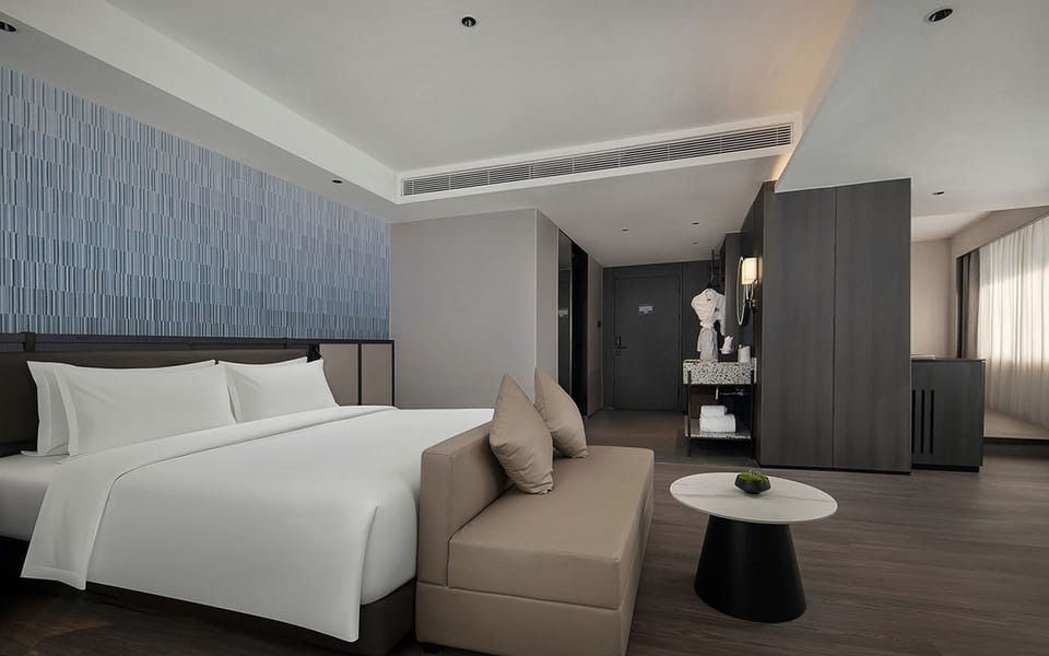 Family Suite, Non Smoking, City View | Egyptian cotton sheets, premium bedding, pillowtop beds, minibar
