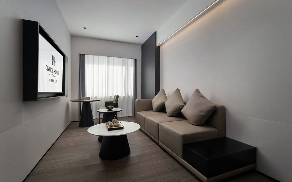 Luxury Suite, 1 King Bed, Non Smoking, City View | Living area | 65-inch LED TV with cable channels, first-run movies, pay movies