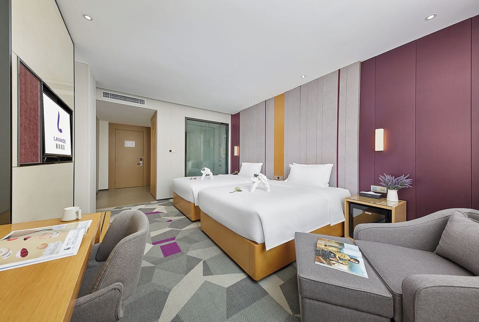 Luxury Twin Room, City View | Desk, laptop workspace, blackout drapes, soundproofing