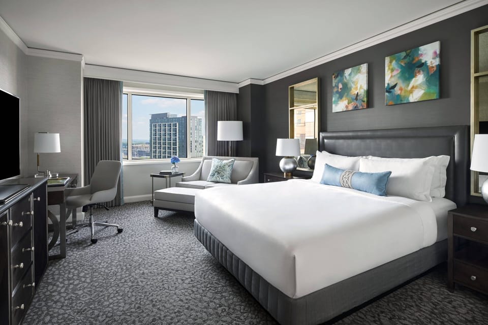 Premium bedding, down comforters, pillowtop beds, minibar