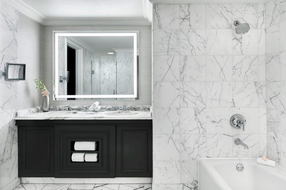 Designer toiletries, hair dryer, bathrobes, towels