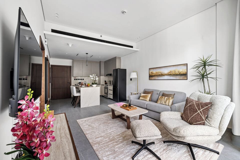 Deluxe Apartment, Balcony | Living area | Flat-screen TV