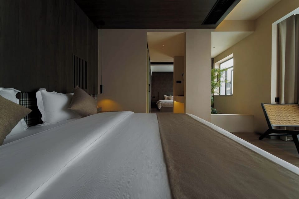 Luxury Suite, City View | Blackout drapes, soundproofing, WiFi (free), bed sheets