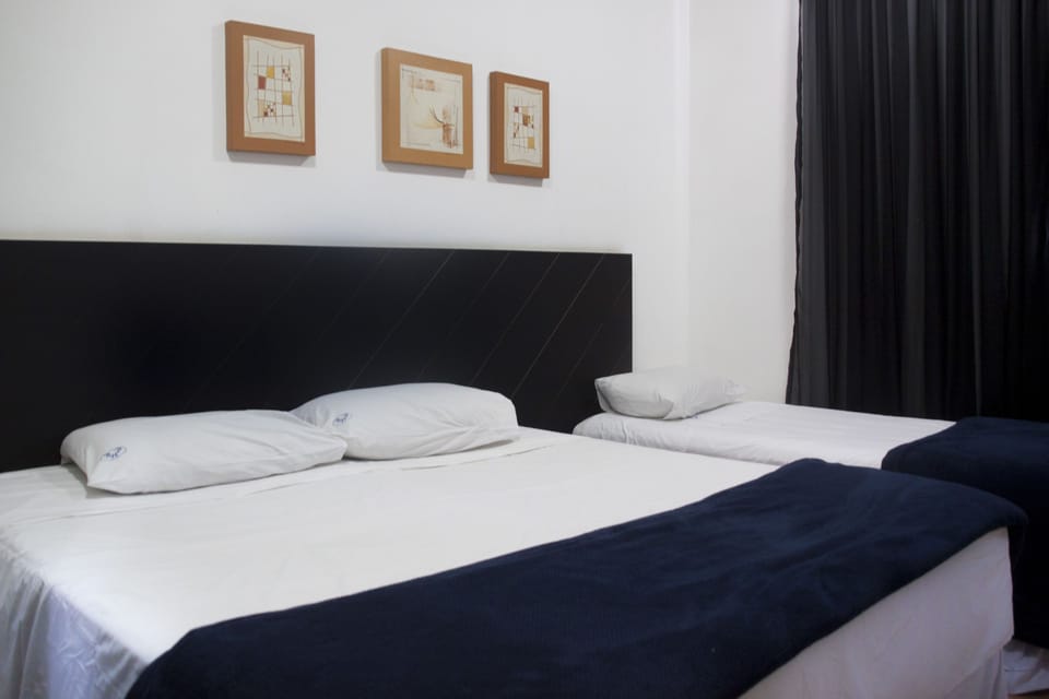 Standard Triple Room | Premium bedding, minibar, in-room safe, desk