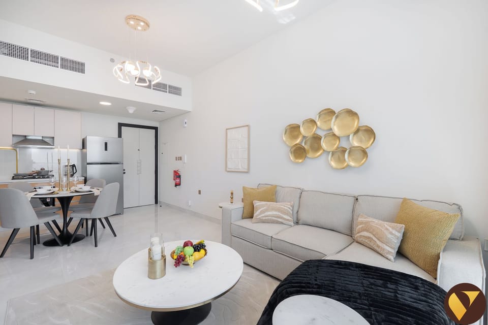 Standard Apartment, 1 King Bed with Sofa bed, Balcony, City View | Living area | 65-inch Smart TV with cable channels