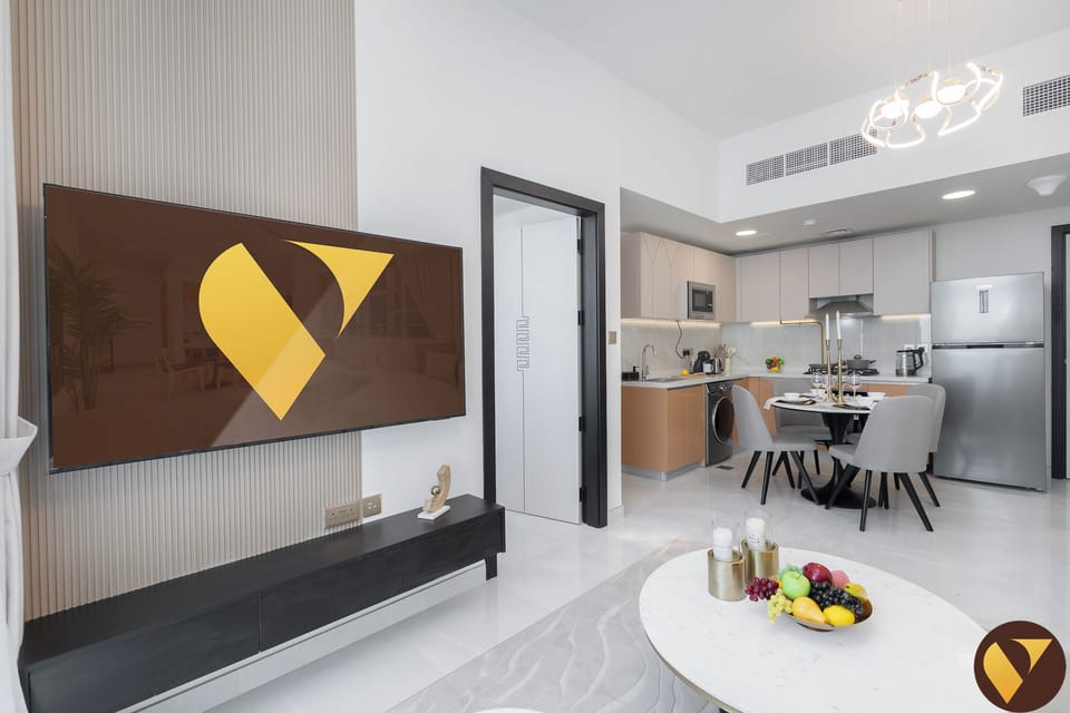 Standard Apartment, 1 King Bed with Sofa bed, Balcony, City View | Living room | 65-inch Smart TV with cable channels