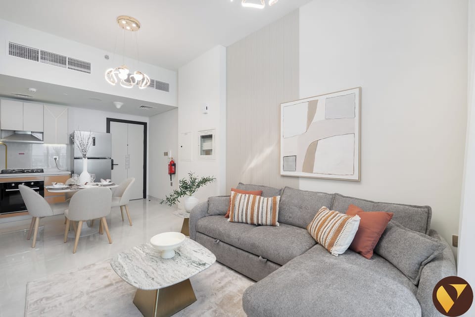 Standard Apartment, 1 King Bed with Sofa bed, Balcony, City View | Living area | 65-inch Smart TV with cable channels