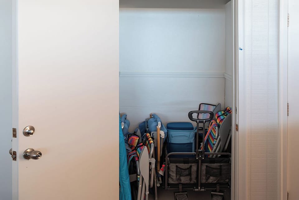 Private Storage Locker in the building holds beach chairs, beach wagon and coolers