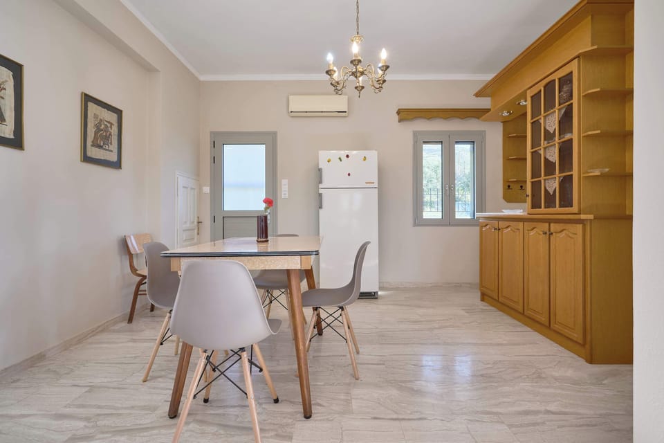 Spacious kitchen with large windows and plenty of prep space