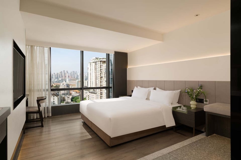 Classic Double Room, City View | Minibar, desk, laptop workspace, blackout drapes