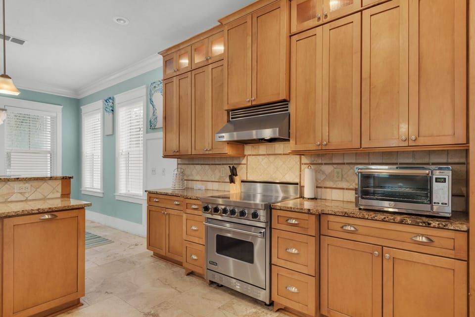 Granite counters, Viking range, stainless appliances, tons of custom cabinets. 