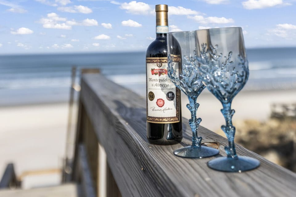 Daytona Beach Vacation Rental Oceanfront Airbnb VRBO Pet Friendly Private Access Game Room Rooftop Patio