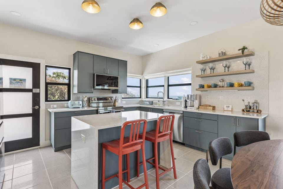 Daytona Beach Vacation Rental Oceanfront Airbnb VRBO Pet Friendly Private Access Game Room Rooftop Patio