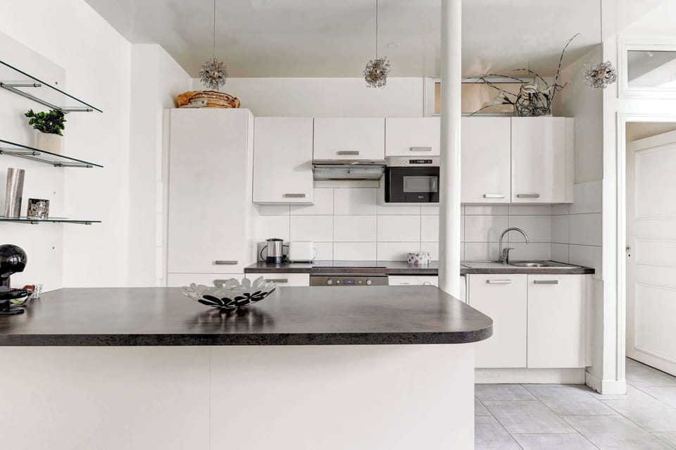 The kitchen is fully equipped to prepare a simple meal 