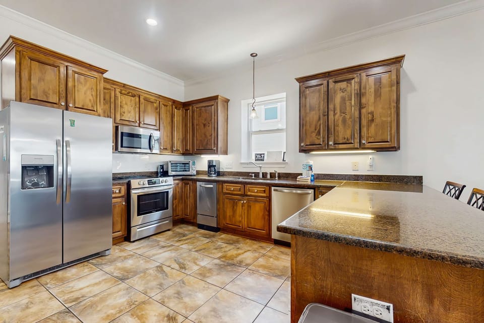 Fully equipped kitchen with stainless steel appliances