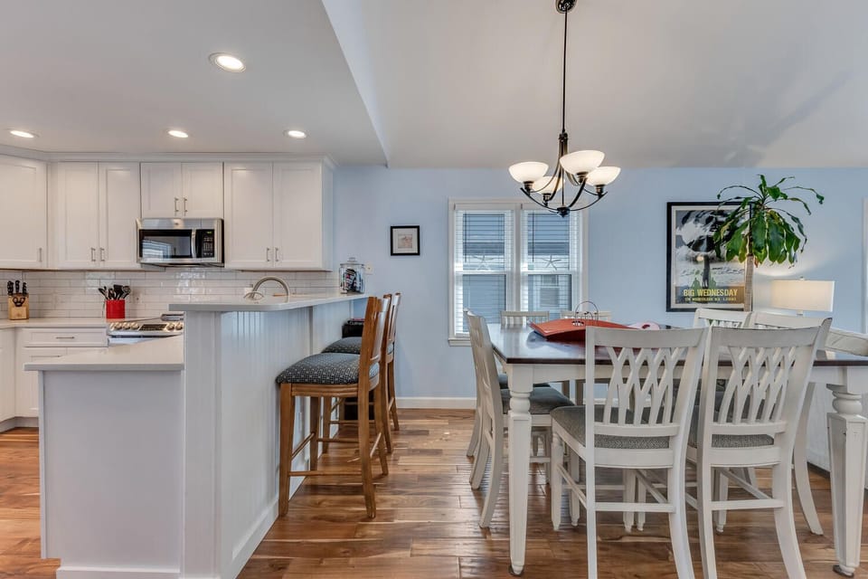 Your bright, open kitchen flows seamlessly into the dining area, perfect for cooking meals and gathering around the table together.