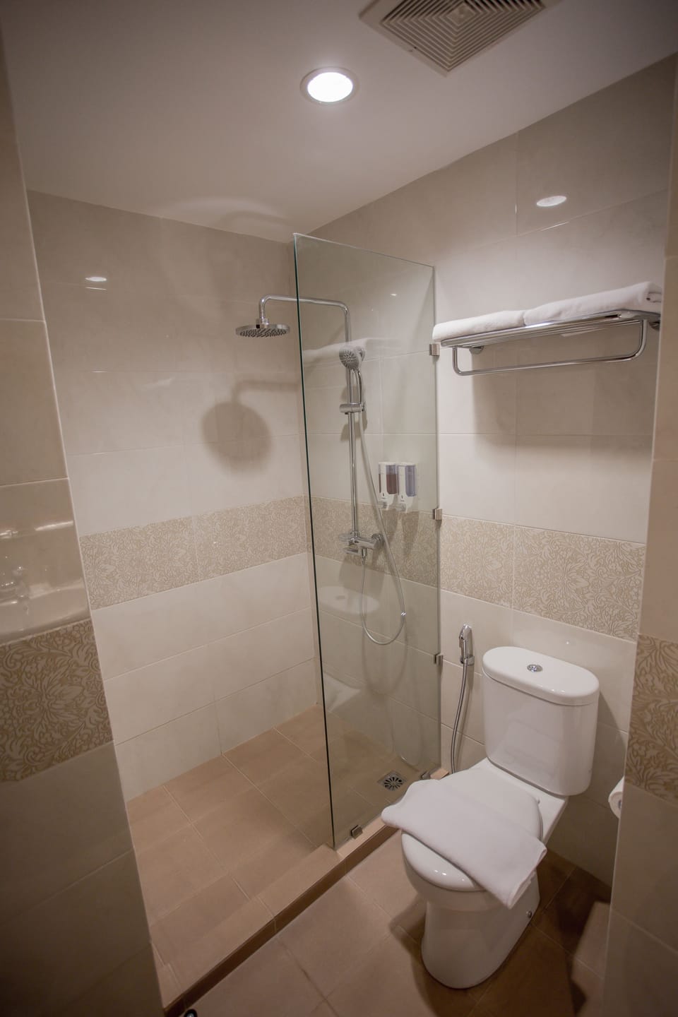 Shower, free toiletries, slippers, towels