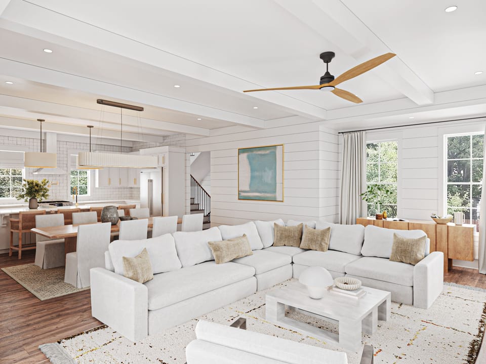 Sink into this expansive sectional sofa where you'll unwind under soaring ceilings with exposed beams and modern ceiling fans.