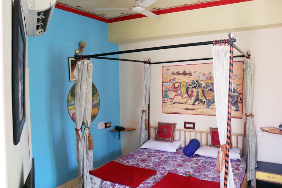 Deluxe Room | 13 bedrooms, in-room safe, desk, individually furnished