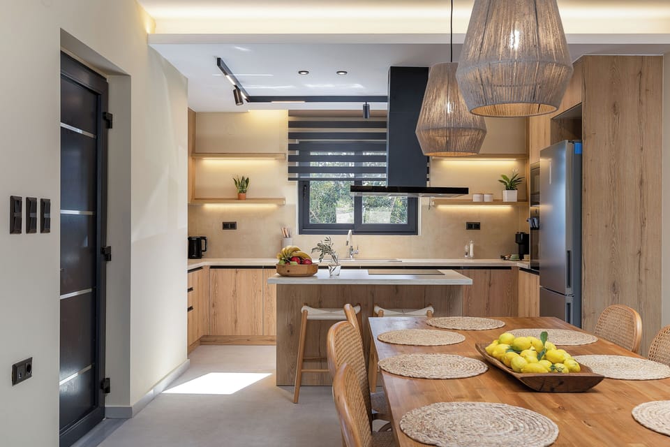 fully equipped kitchen with dining table for 8 guests