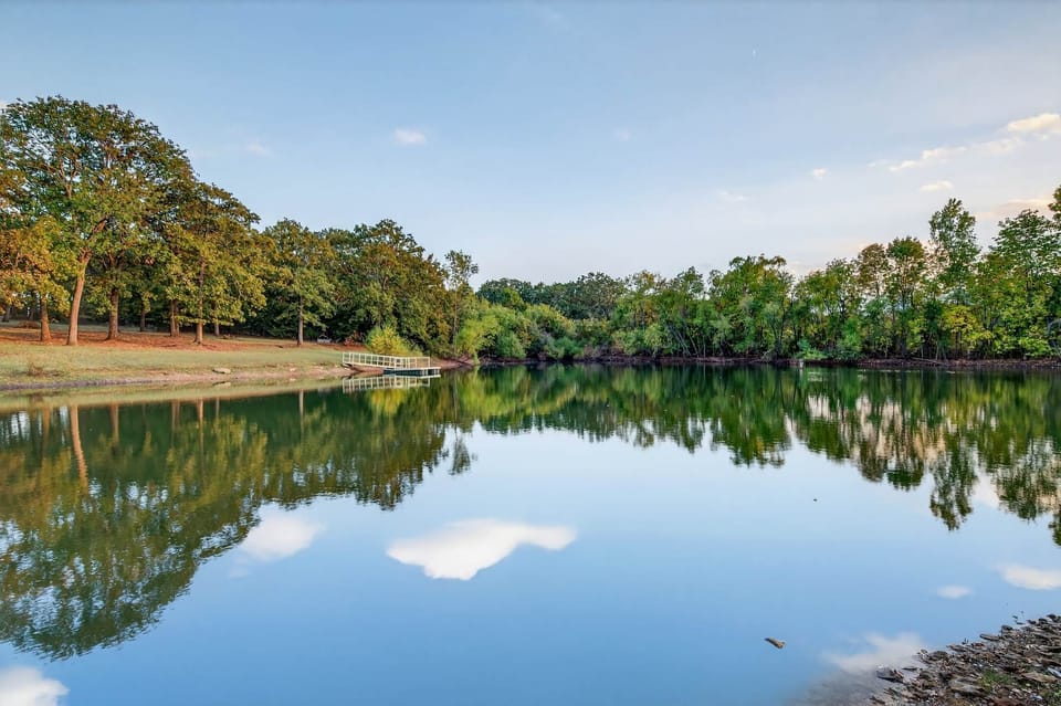 Peaceful pond view behind the property.