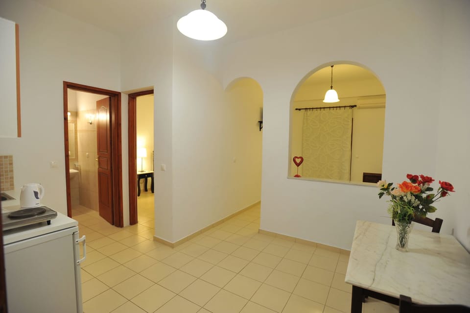 Apartment, 1 Bedroom | Living area | Flat-screen TV