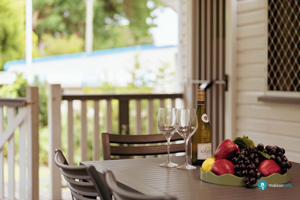 Relax and enjoy a glass of wine or a morning coffee and the back deck