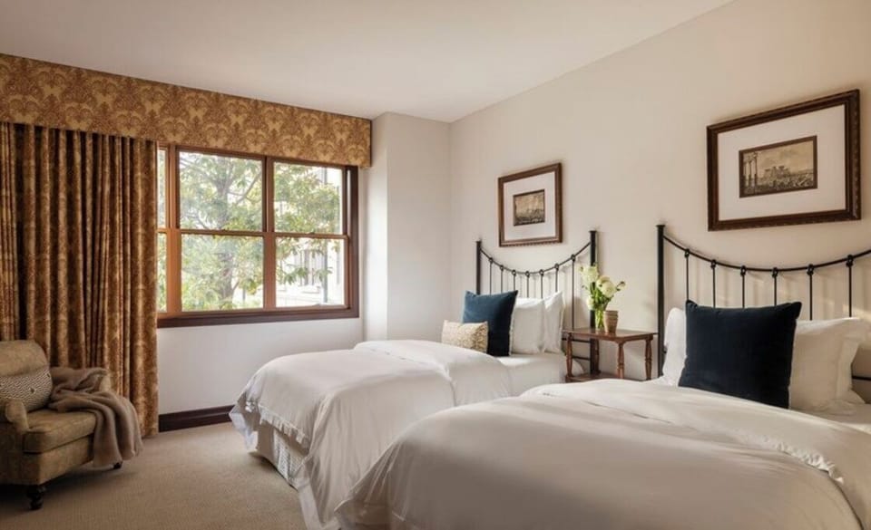 Recharge in a sunlit bedroom designed for restful nights.