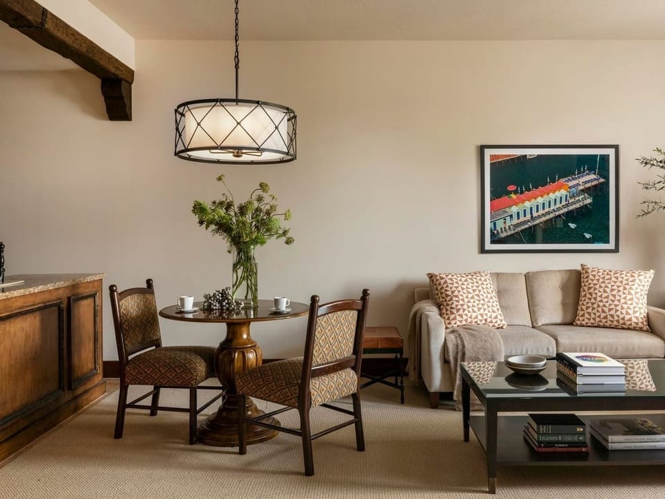 Unwind in the cozy lounge with intimate dining nearby.