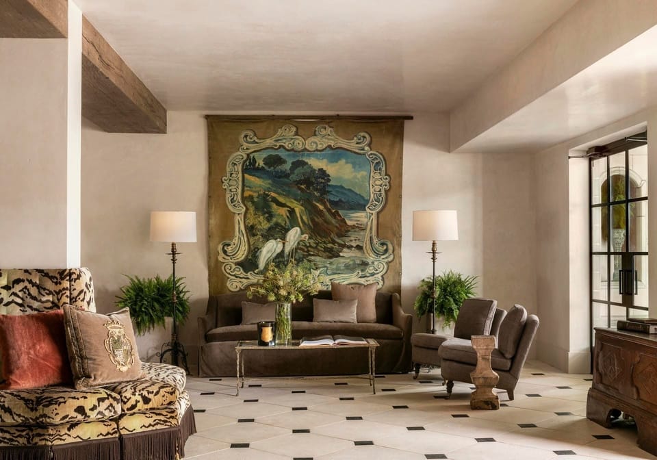 Unwind in the elegant lobby with plush seating and art.