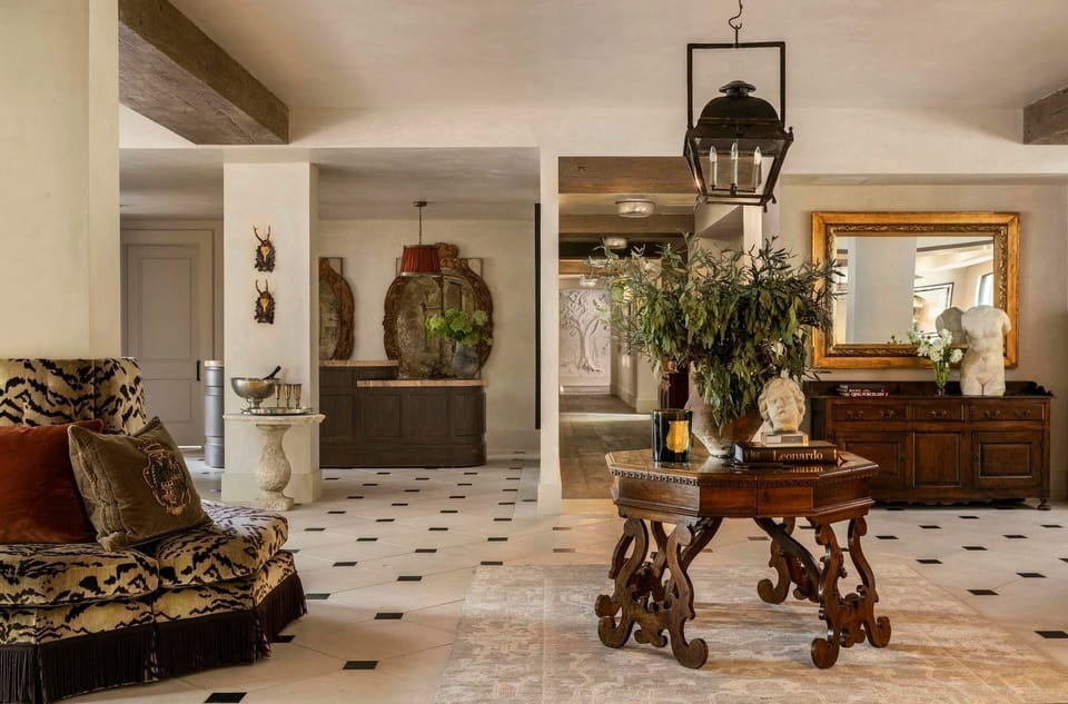 Arrive to a grand foyer that feels calm and curated.