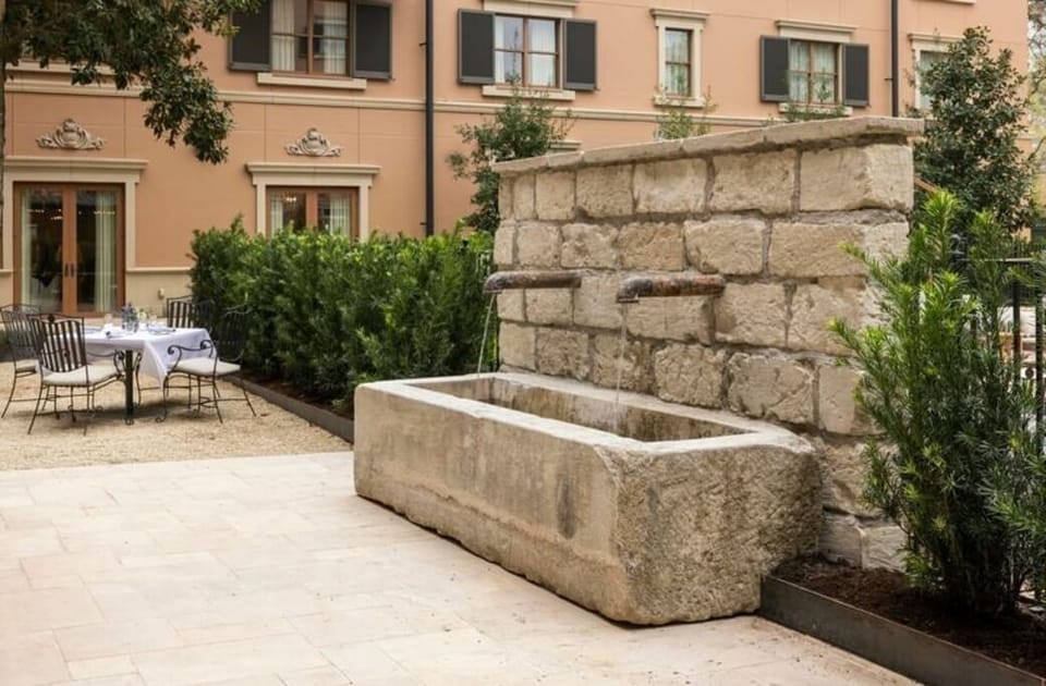 Refresh your senses beside the courtyard fountain’s calming flow.