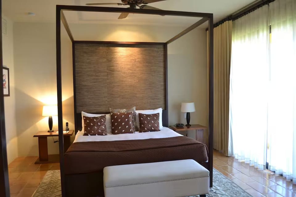 Stretch out in a serene suite with soft light and space.