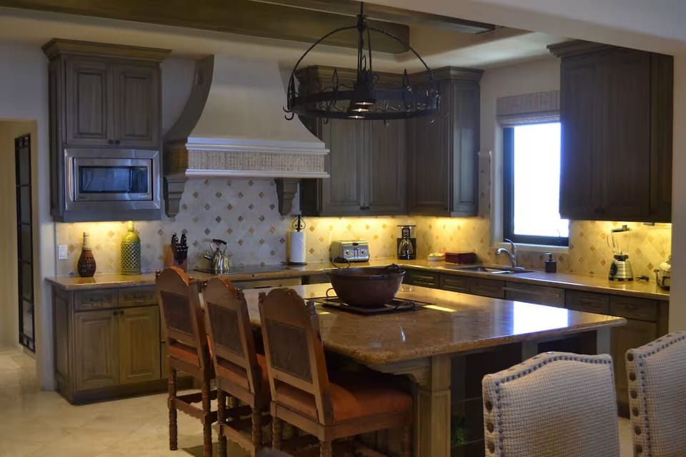 Lounge comfortably in the open-plan space with soft lighting.