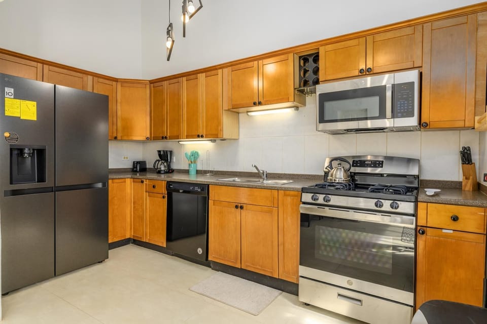 Fully equipped and thoughtfully designed, this modern kitchen makes vacation cooking easy!  from quick beach breakfasts to relaxed family dinners.
