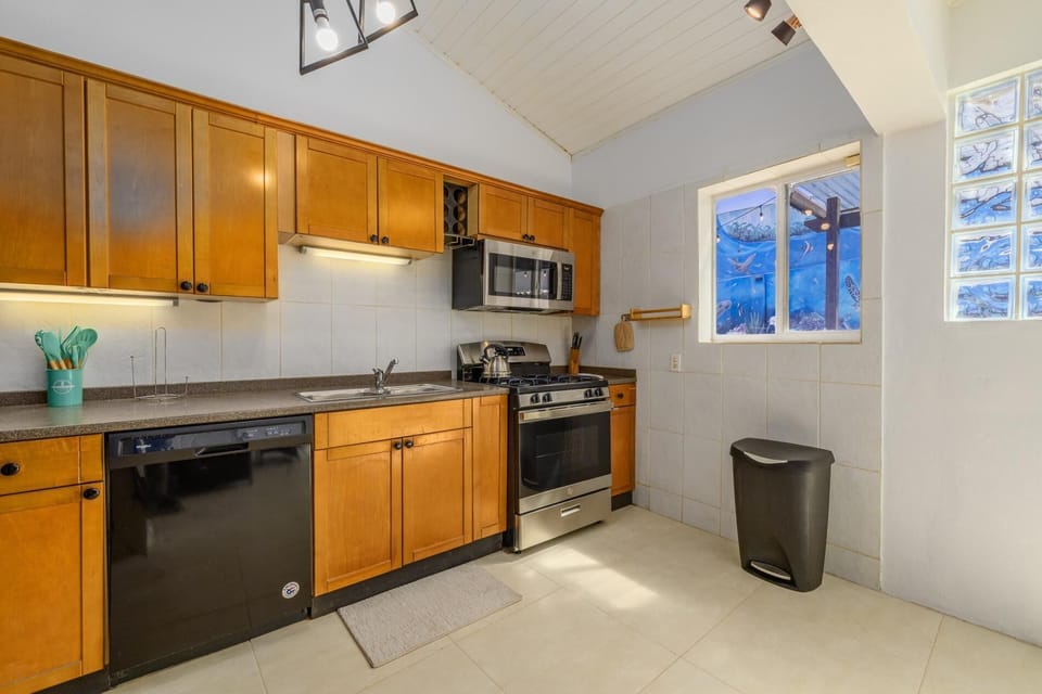 Fully equipped and thoughtfully designed, this modern kitchen makes vacation cooking easy!  from quick beach breakfasts to relaxed family dinners.