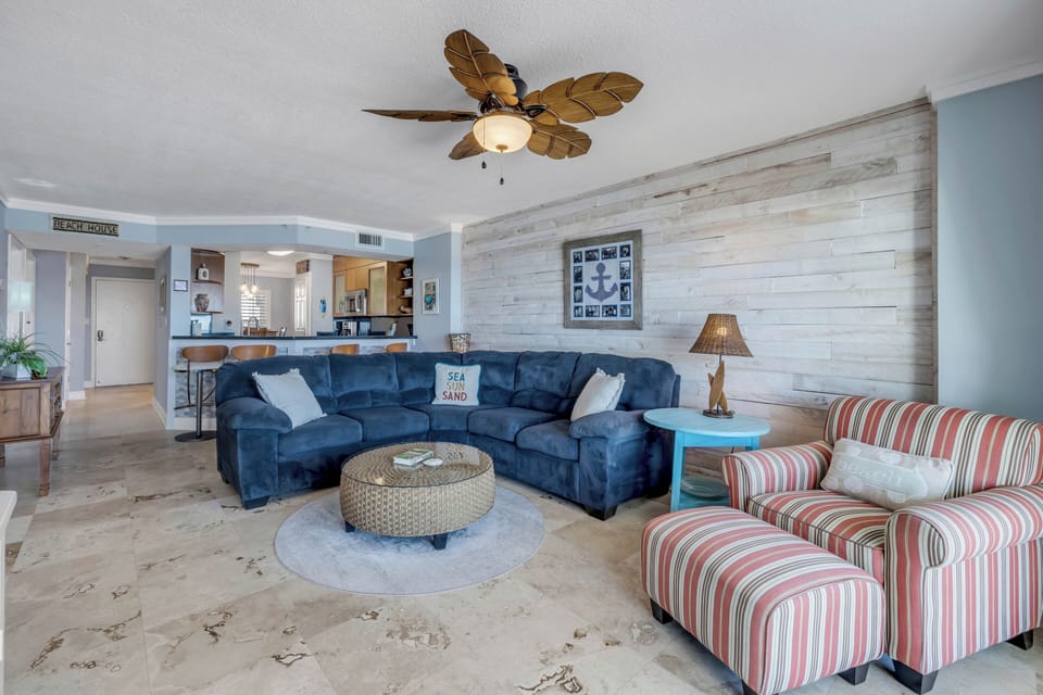 Inviting seating in the oceanfront living room welcomes you to relax while enjoying sweeping Atlantic Ocean views