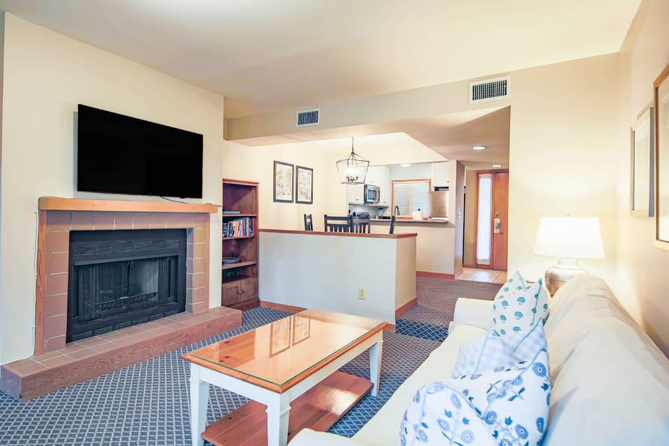 The kitchen flows into the dining area and living room.  Fireplace is not available for guest use.