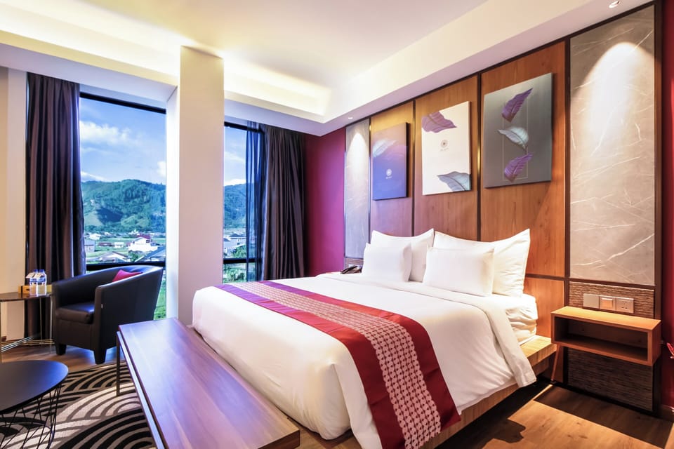 Junior Suite, Mountain View | In-room safe, iron/ironing board (on request), WiFi (free), bed sheets