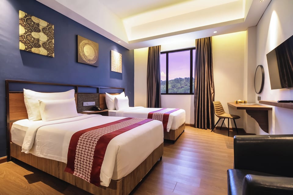 Deluxe Twin Room, Mountain View | In-room safe, iron/ironing board (on request), WiFi (free), bed sheets