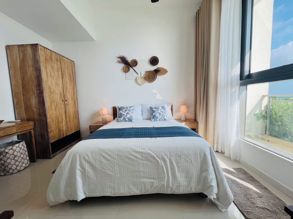 Apartment, 2 Bedrooms, Ocean View | In-room safe, iron/ironing board, free WiFi